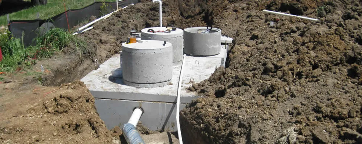 Septic system repair and installation site with tank access ports in Lakeland, FL