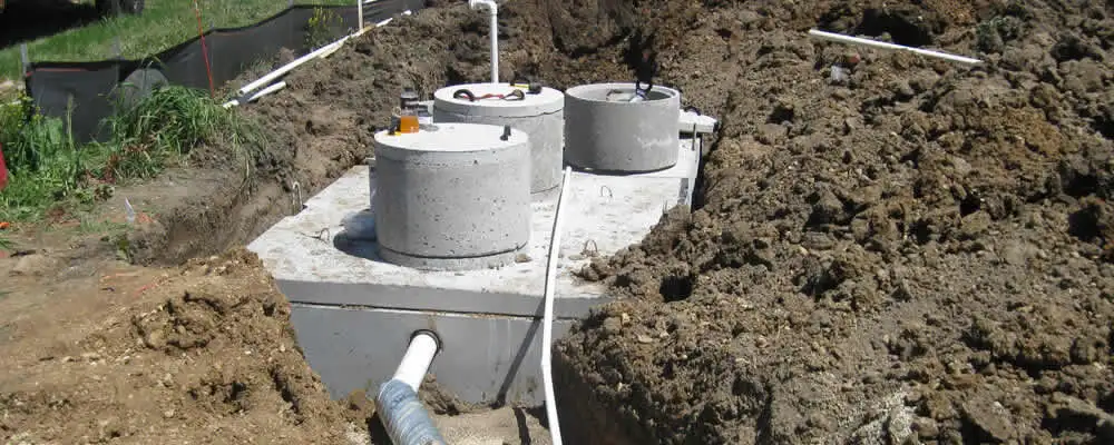 Septic system repair and installation site with tank access ports in Lakeland, FL